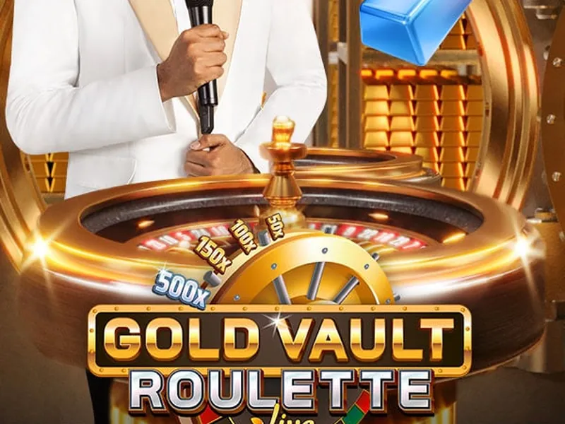 Presentador de Gold Vault Roulette junto a la rueda con multiplicador 500x